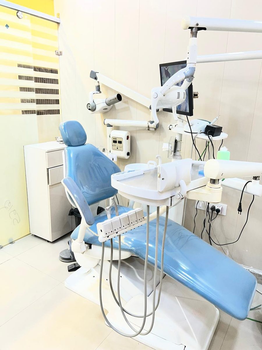 A CareWell treatment room with a chairside screen for showing X-rays to patients