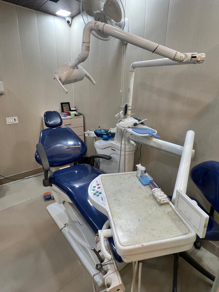 A third CareWell treatment room with dental chair and instrument tray